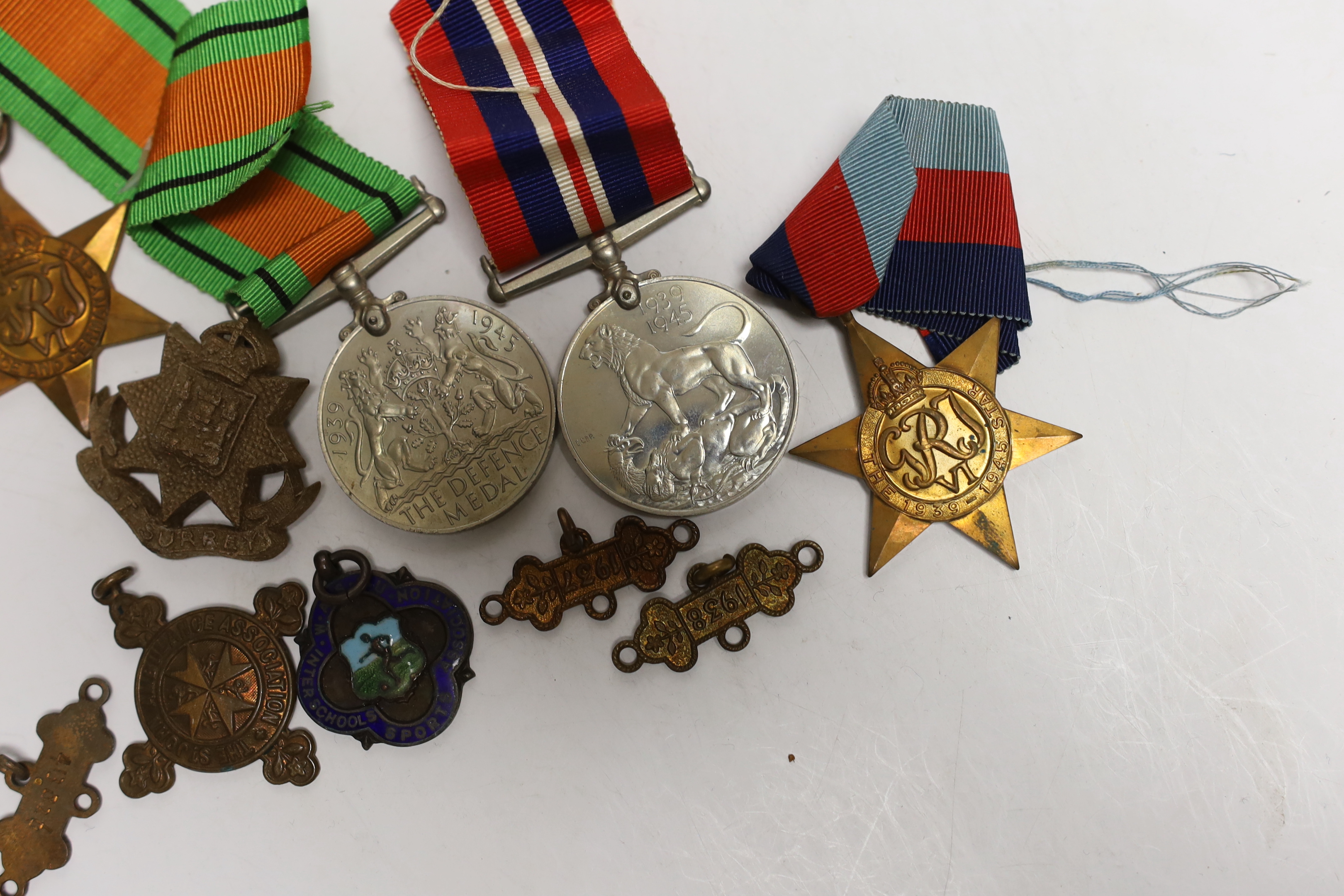 Four WW2 medals- the Defence Medal, the War medal, the 1939-1945 Star and the France & Germany Star and other minor items.
